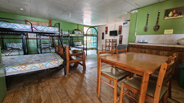 Family Cottage dining area with sink for washing dishes and group meal cleanup