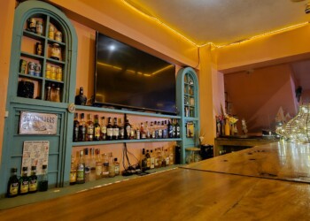 Full-service bar with imported alcohol brands at large group family reunion venue social hub