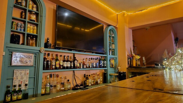 Full-service bar with imported alcohol brands at large group family reunion venue social hub