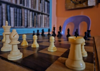 view of chessboard and pieces for family reunion group games and relaxation