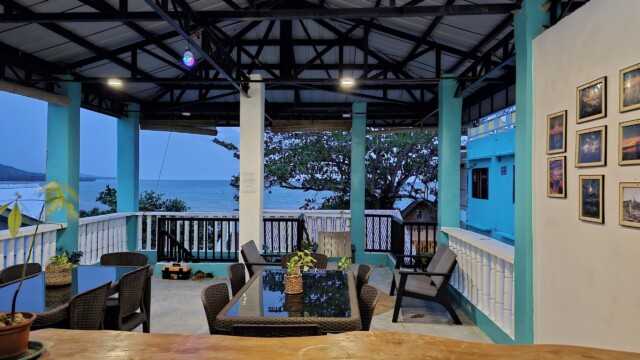 Casa Maria function deck with tables and chairs and stunning ocean view for family reunion venue events