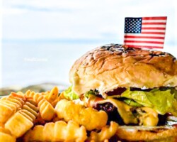 Papa Doug's famous signature cheeseburger and fries at Steak & Grill near San Carlos City