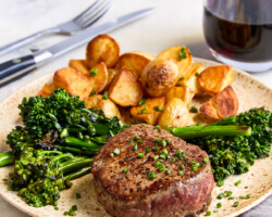 Elegance on a plate. Our Signature Bacon-Wrapped Filet Mignon is the height of our professionally managed F&B program... this dish makes the drive from San Carlos truly worthwhile. Plated Bacon-Wrapped Filet Mignon steak dinner at the best Steakhouse near San Carlos City