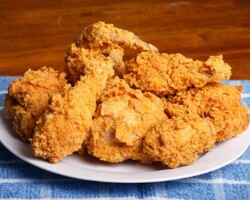 Crispy on the Outside, Juicy Inside. Our cook uses a unique local breading mix and years of expertise to make this a guaranteed favorite for the whole family, served fresh by the sea. Crispy Fried Chicken dinner, a popular favorite at the family restaurant near San Carlos City