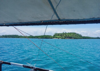 Party boat for large group activities approaching Tinisen Island near family reunion venue bacolod
